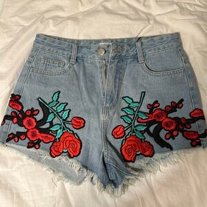 Denim shorts with intricate rose details!